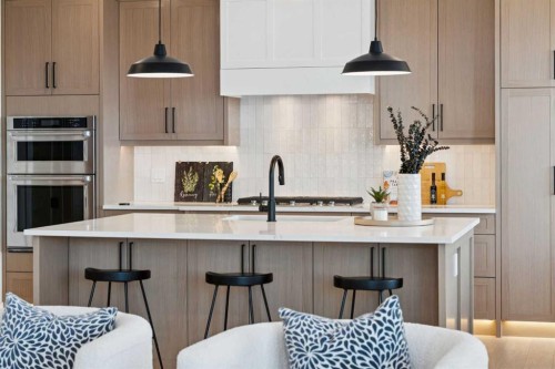 6 Westmount Point, Okotoks, AB - Indoor Photo Showing Kitchen With Upgraded Kitchen