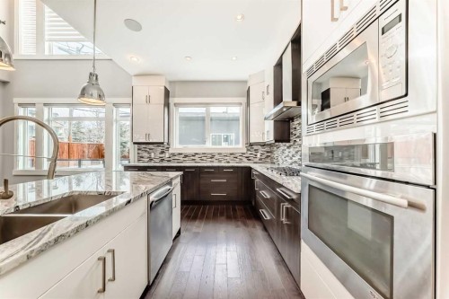 230 37 Street Nw, Calgary, AB - Indoor Photo Showing Kitchen With Double Sink With Upgraded Kitchen