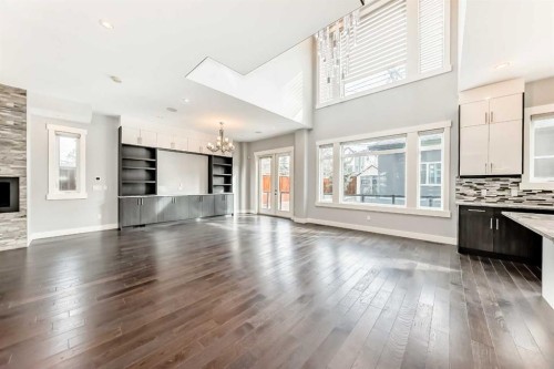 230 37 Street Nw, Calgary, AB - Indoor Photo Showing Living Room With Fireplace