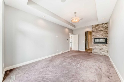 230 37 Street Nw, Calgary, AB - Indoor Photo Showing Other Room With Fireplace