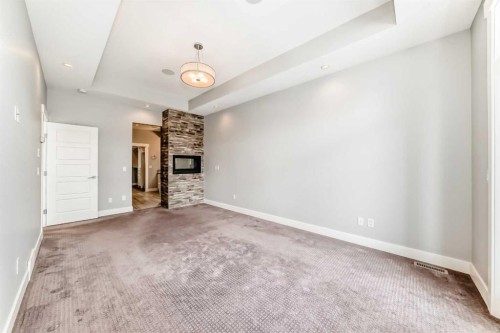 230 37 Street Nw, Calgary, AB - Indoor Photo Showing Other Room With Fireplace