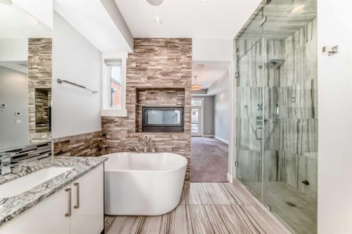 230 37 Street Nw, Calgary, AB - Indoor Photo Showing Bathroom With Fireplace