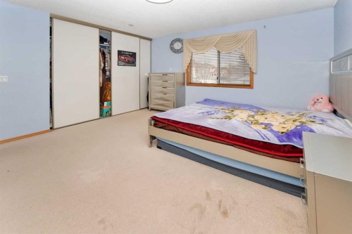 18 Coral Sands Place Ne, Calgary, AB - Indoor Photo Showing Bedroom