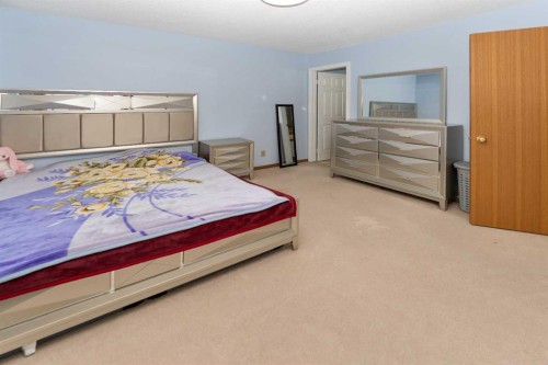18 Coral Sands Place Ne, Calgary, AB - Indoor Photo Showing Bedroom