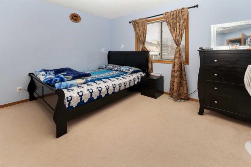 18 Coral Sands Place Ne, Calgary, AB - Indoor Photo Showing Bedroom
