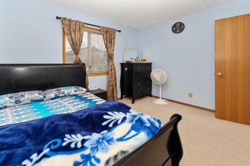 18 Coral Sands Place Ne, Calgary, AB - Indoor Photo Showing Bedroom