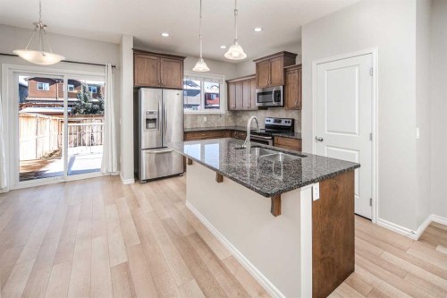 88 Legacy Mews Se, Calgary, AB - Indoor Photo Showing Kitchen With Double Sink With Upgraded Kitchen