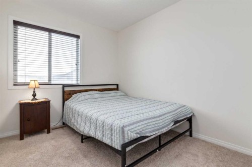 67 Elgin Meadows Park Se, Calgary, AB - Indoor Photo Showing Bedroom