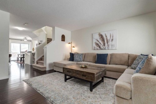 67 Elgin Meadows Park Se, Calgary, AB - Indoor Photo Showing Living Room