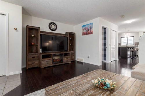67 Elgin Meadows Park Se, Calgary, AB - Indoor Photo Showing Living Room