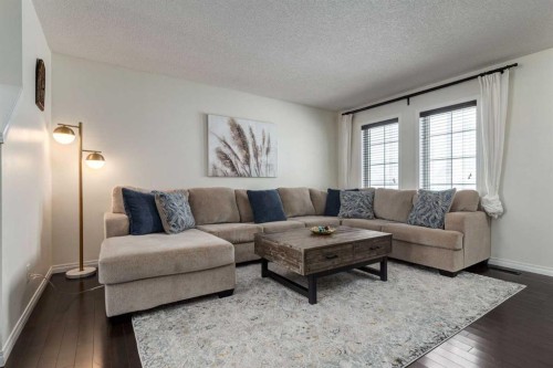 67 Elgin Meadows Park Se, Calgary, AB - Indoor Photo Showing Living Room