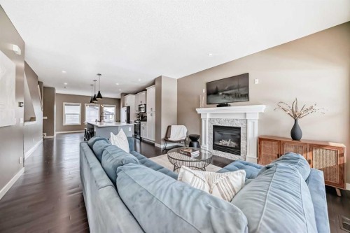 90 Evanspark Road Nw, Calgary, AB - Indoor Photo Showing Living Room With Fireplace