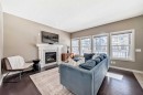 90 Evanspark Road Nw, Calgary, AB  - Indoor Photo Showing Living Room With Fireplace 