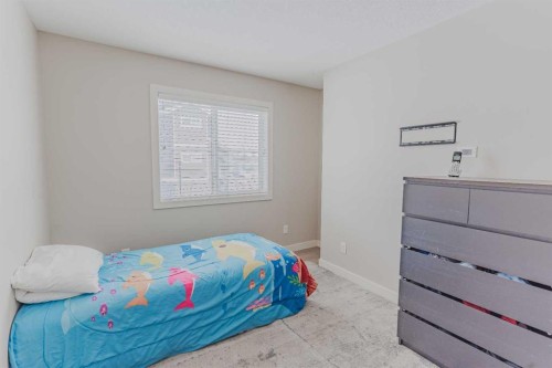 413-355 Nolancrest Heights Nw, Calgary, AB - Indoor Photo Showing Bedroom