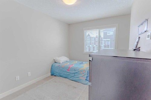 413-355 Nolancrest Heights Nw, Calgary, AB - Indoor Photo Showing Bedroom