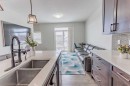 413-355 Nolancrest Heights Nw, Calgary, AB  - Indoor Photo Showing Kitchen With Double Sink 