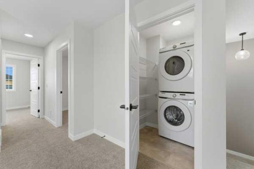 213 Bayview Park Sw, Airdrie, AB - Indoor Photo Showing Laundry Room