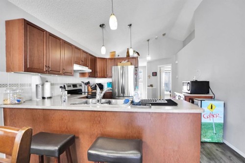 94 Inverness Park Se, Calgary, AB - Indoor Photo Showing Kitchen With Double Sink With Upgraded Kitchen