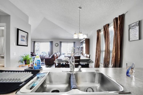 94 Inverness Park Se, Calgary, AB - Indoor Photo Showing Kitchen With Double Sink