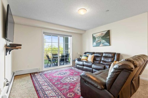 4104-279 Copperpond Common Se, Calgary, AB - Indoor Photo Showing Living Room