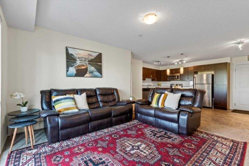 4104-279 Copperpond Common Se, Calgary, AB - Indoor Photo Showing Living Room