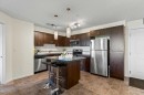 4104-279 Copperpond Common Se, Calgary, AB  - Indoor Photo Showing Kitchen With Stainless Steel Kitchen With Double Sink 