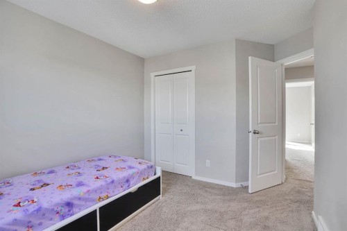 82 Walden Drive Se, Calgary, AB - Indoor Photo Showing Bedroom