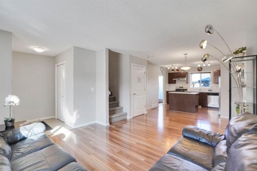 82 Walden Drive Se, Calgary, AB - Indoor Photo Showing Living Room
