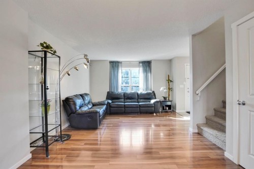 82 Walden Drive Se, Calgary, AB - Indoor Photo Showing Living Room