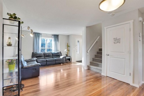 82 Walden Drive Se, Calgary, AB - Indoor Photo Showing Living Room