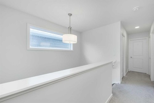 399 Magnolia Drive Se, Calgary, AB - Indoor Photo Showing Other Room