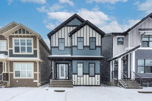 399 Magnolia Drive Se, Calgary, AB - Outdoor With Facade