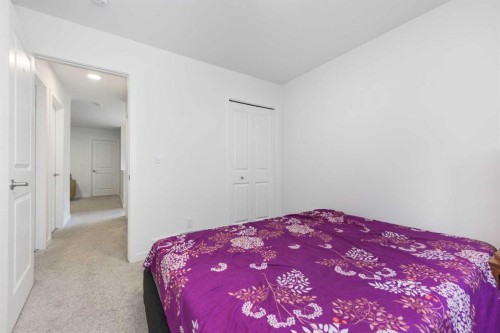 399 Magnolia Drive Se, Calgary, AB - Indoor Photo Showing Bedroom