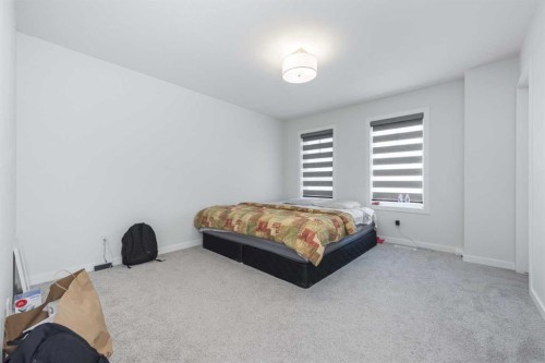 399 Magnolia Drive Se, Calgary, AB - Indoor Photo Showing Bedroom