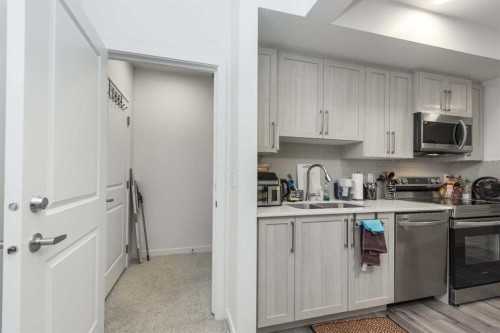 399 Magnolia Drive Se, Calgary, AB - Indoor Photo Showing Kitchen With Double Sink