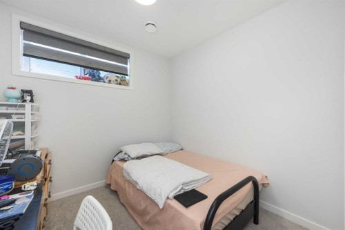 399 Magnolia Drive Se, Calgary, AB - Indoor Photo Showing Bedroom