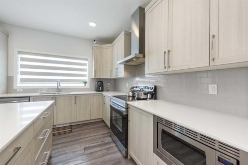 399 Magnolia Drive Se, Calgary, AB - Indoor Photo Showing Kitchen With Upgraded Kitchen