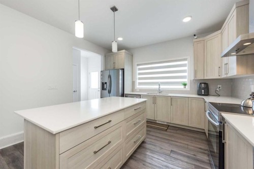 399 Magnolia Drive Se, Calgary, AB - Indoor Photo Showing Kitchen With Upgraded Kitchen