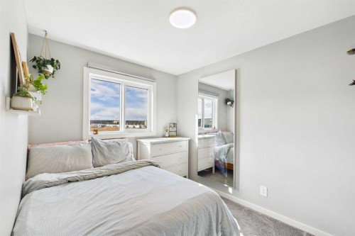 41 Heirloom Crescent Se, Calgary, AB - Indoor Photo Showing Bedroom