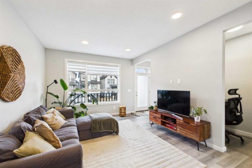 41 Heirloom Crescent Se, Calgary, AB - Indoor Photo Showing Living Room