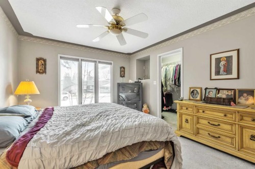 55 Midlake Place Se, Calgary, AB - Indoor Photo Showing Bedroom