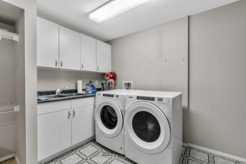 55 Midlake Place Se, Calgary, AB - Indoor Photo Showing Laundry Room
