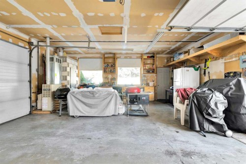 55 Midlake Place Se, Calgary, AB - Indoor Photo Showing Garage