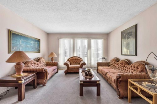 55 Midlake Place Se, Calgary, AB - Indoor Photo Showing Living Room