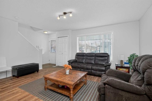 260 Stonemere Place, Chestermere, AB - Indoor Photo Showing Living Room