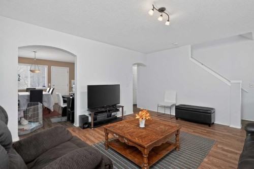 260 Stonemere Place, Chestermere, AB - Indoor Photo Showing Living Room