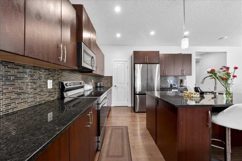 7 Redstone Park Ne, Calgary, AB - Indoor Photo Showing Kitchen With Upgraded Kitchen