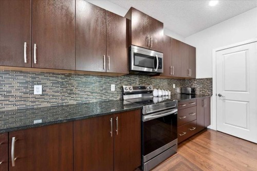 7 Redstone Park Ne, Calgary, AB - Indoor Photo Showing Kitchen With Upgraded Kitchen