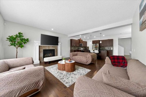 7 Redstone Park Ne, Calgary, AB - Indoor Photo Showing Living Room With Fireplace