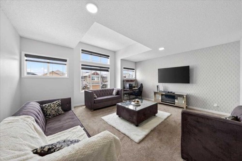 7 Redstone Park Ne, Calgary, AB - Indoor Photo Showing Living Room